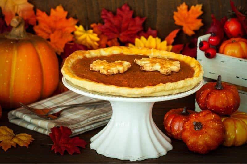 pumpkin pie on a stand